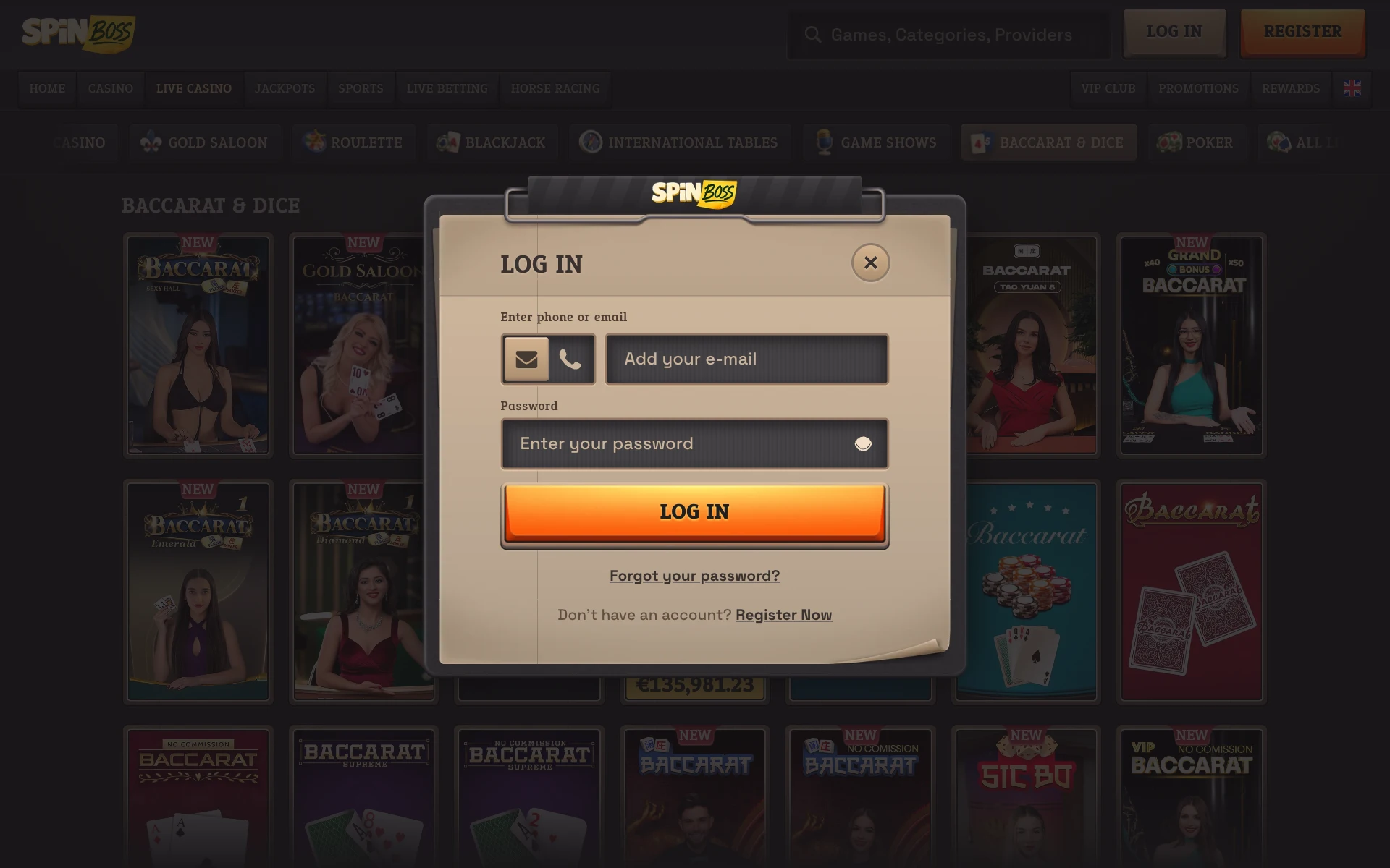 SpinBoss log-in window over the Baccarat & Dice lobby